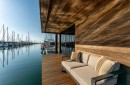 Floating House takes the idea of a mobile home and makes it luxurious: a floating cabin with gorgeous styling