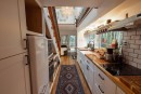 Custom two-level tiny home The Fox Den is a gorgeous example of luxurious living in a compact footprint