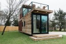 The Helm is a two-level tiny home with a private deck and two full bathrooms
