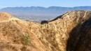 Jeep Wrangler drives up bike trail, gets stuck on mountain ridge