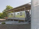 The Locomotive Ranch Trailer is a luxury, gorgeous lake house built around a 1954 Spartan trailer