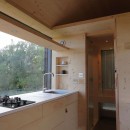 The Long Shed is a prefab tiny house, self-sufficient and quite elegant