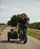 The Phatfour Sidecar is an e-bike sidecar to take your child or pet on rides, or carry groceries