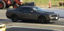 Tuned Dodge Challenger Hellcat takes on stock Challenger Demon