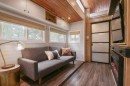 The SerendipTiny home is based on the Aurora model, with two massive slide-outs nearly doubling living space at camp
