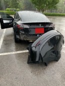 Tesla Model 3 rear bumper detaches after driving in the rain
