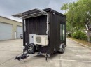 The Snowball custom tiny is a tiny house for a cockatoo, but doubles as a toy hauler