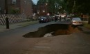 The stunning moment a Dodge van was swallowed by a giant sinkhole in the Bronx