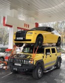 Hummer carries a Rolls-Royce on its roof