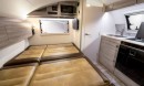 The Ultimate Camper offers a full wet bath, two kitchens and queen-size bed, in the small footprint of a teardrop trailer