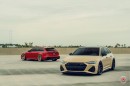 Audi RS6 models posing on Vossen wheels