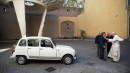 Pope Francis receives the gift of an old and used Renault 4L