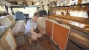 This $12K Skoolie Has a Unique Cabin Aesthetic With a Wood-Burned Ceiling and a Custom Bar