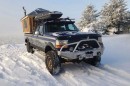 Modified Ford F-350 to include small-scale log cabin