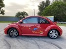 1998 Volkswagen Beetle with Sega Dreamcast video game console