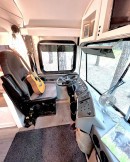 Converted 2005 Bluebird All-American bus is a comfortable permanent home to family of nine