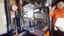 This 6x6 Camper Is the Ultimate Off-Grid Man Cave With a Huge Garage and a Movie Theater
