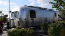 2001 restored Airstream with two bedrooms and a fuctional kitchen is the perfect mobile home for a family of four