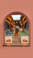 Psychedelic van conversion with funky interior and massive solar array