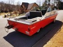 The 1995 Boatcar melds together a Ford E-350 and a Sea Ray Sundancer boat