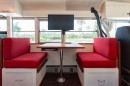 This colorful Skoolie is both music studio and tiny home on wheels