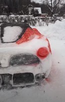 Ferrari LaFerrari made entirely out of snow, found in Lithuanian couple's yard