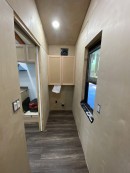 Based on the Pioneer layout, this custom tiny is a dry cabin with elegant styling