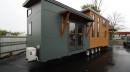 This custom park model tiny house is a complete family home with a bunch of surprising features