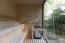 hinterhouse is an EV-friendly, absolutely striking cabin hidden in the woods