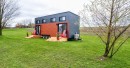 Modern tiny house on wheels by Express Tiny Homes