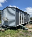 This park model tiny house brings a very airy and cozy design with no compromise on comfort or functionality
