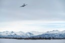C-17 Globemaster III taking off from runway in Alaska