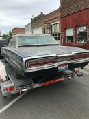 Ford T-Bird towed away