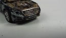 Ruined diecast Mercedes-Maybach Pullman
