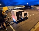 This e-bike trailer is very light, comfortable, cheap, and runs under its own power