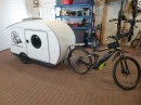 The Velocamper is a mini-RV designed for an electric bicycle, with quite a surprisingly elegant interior