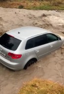 Audi A3 gets driven into a river, physics happens
