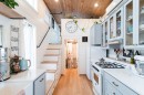 Farmhouse-style tine house on wheels