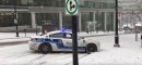 Pileup on snowy banked Canadian street