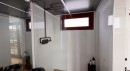 Luxurious container tiny house copper shower