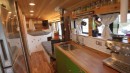 This Short School Bus Is a Snug Cabin on Wheels With an XL Bathroom and a Full Kitchen