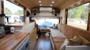School Bus Converted Into a mobile Home With a Roof Raise