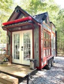 Unique little firehouse comes with a slide pole, a fire hydrant, and an outdoor shower