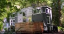 $102K Tiny house with plenty of living space and two lofts