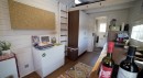 Affordable tiny house with a loft bedroom and functional kitchen