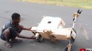 Teenager builds an electric scooter with solar panels from firewood and discarded parts