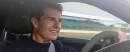 Tom Cruise, David Coulthard, and Mark Webber on the track