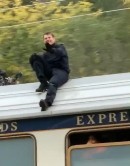 Tom Cruise prepares for another MI7 stunt on top of a speeding train