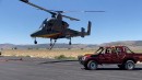 1989 Toyota Hilux gets dropped from helicopter hovering at 10,000 ft in the air on WhistlinDiesel
