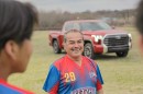 Ismael Guzman meets with his East Austin soccer club members during practice
